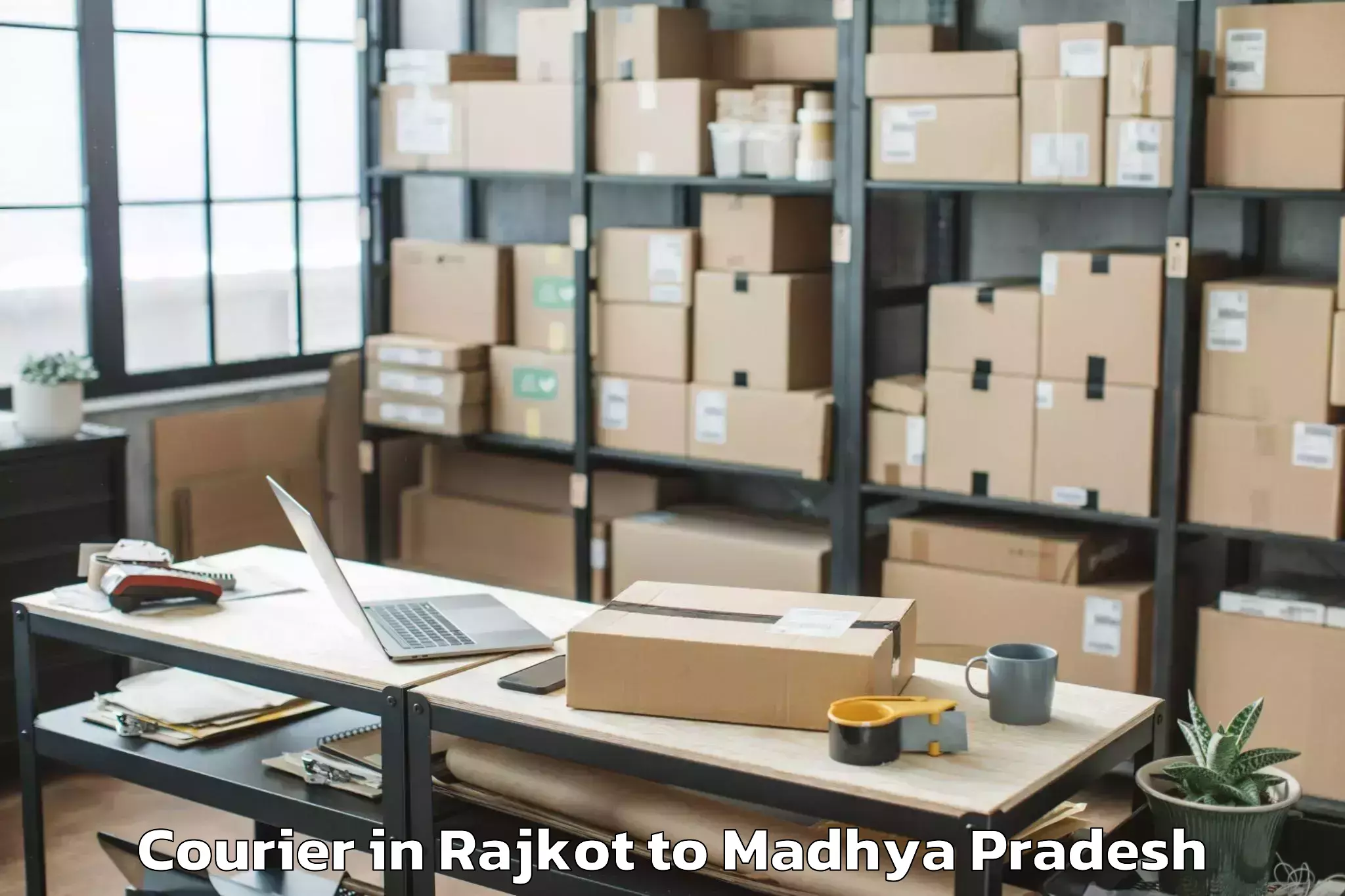 Reliable Rajkot to Kundam Courier